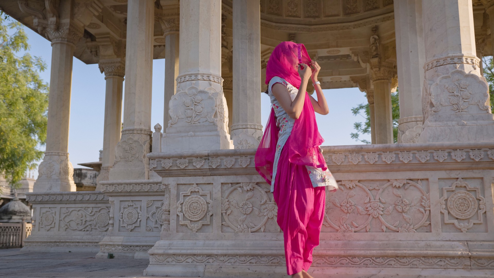 Indian young woman inside a temple, Jaipur city, India